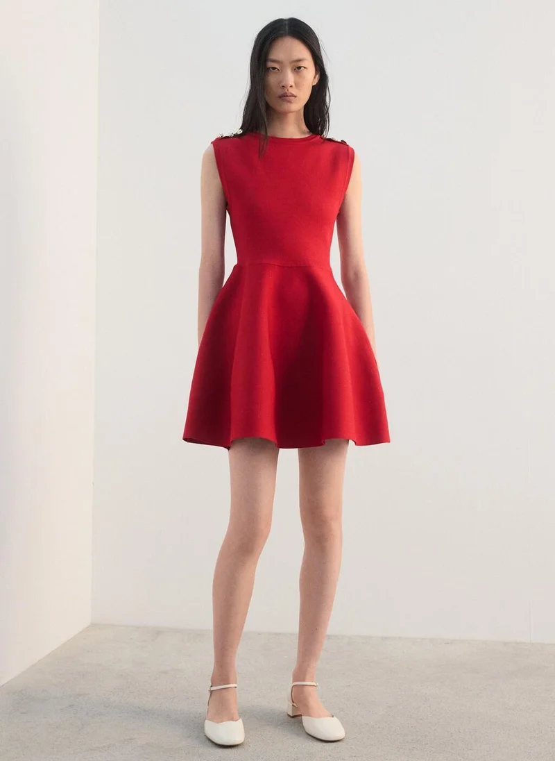 Peplum knit dress with buttons